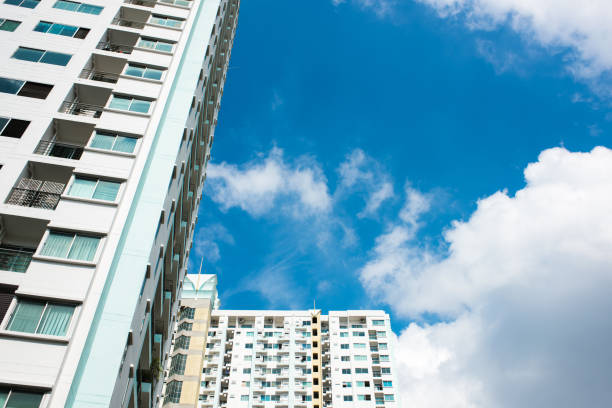 istock image of condo building and blue sky background. 1081868920