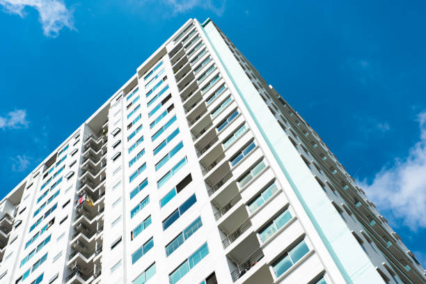 istock image of condo building and blue sky background. 1081868922