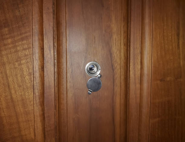 Peephole door peephole in the room stock photo