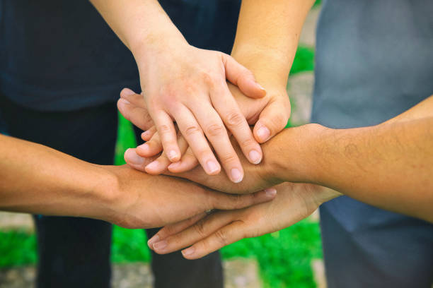 istock The human hands touching together,for power and success,teamwork concept 1081871716
