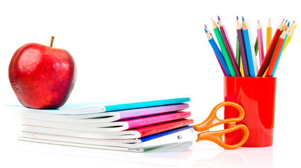 istock notebooks, pencils and apple. Back to school concept. 1081881626