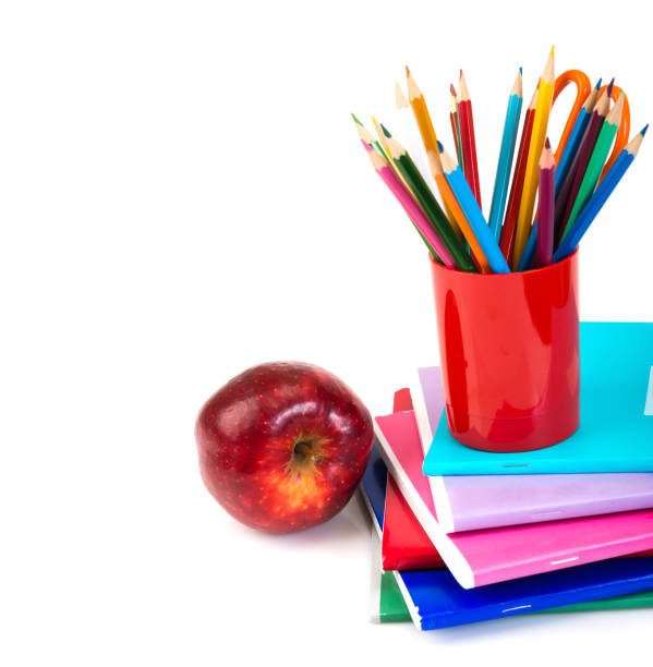 istock notebooks, pencils and apple. Back to school concept. 1081881666