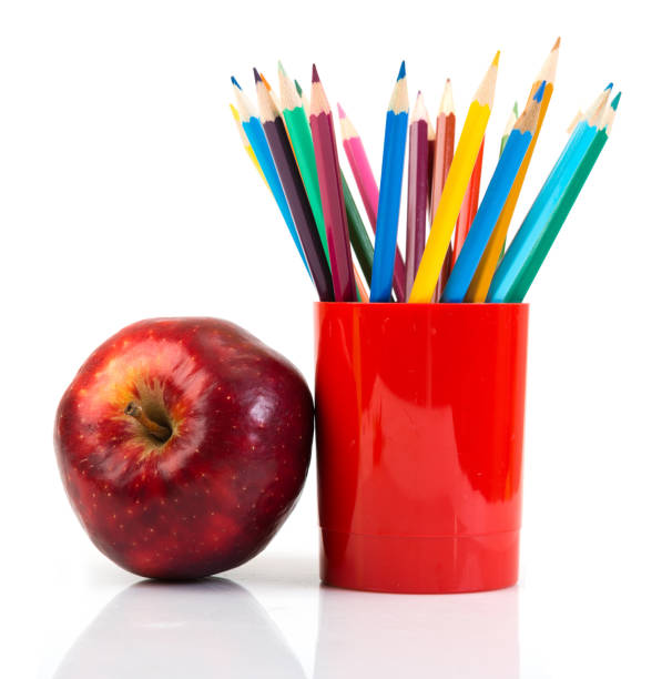 istock pencils and apple. Back to school concept. 1081881672