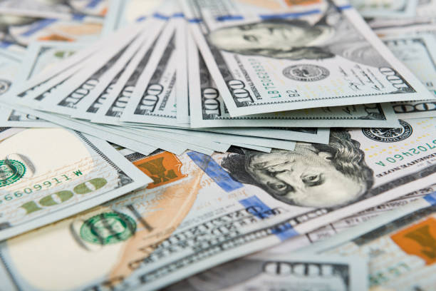 istock Background with money american hundred dollar bills 1081884336