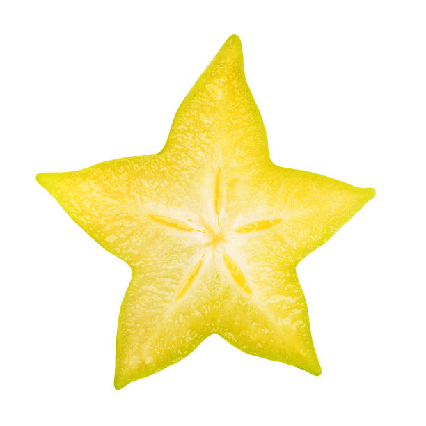 Carambola star fruit slice isolated Carambola star fruit slice isolated, star apple or yellow starfruit on white background. Clipping path included. starfruit stock pictures, royalty-free photos & images