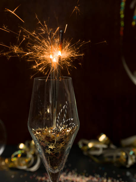 istock new year background with star splatter and sparkler and different new year items 1081888978