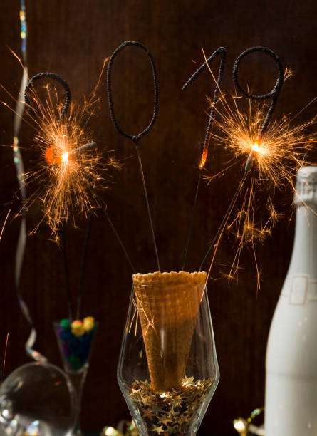 istock new year background with star splatter and sparkler and different new year items 1081889154