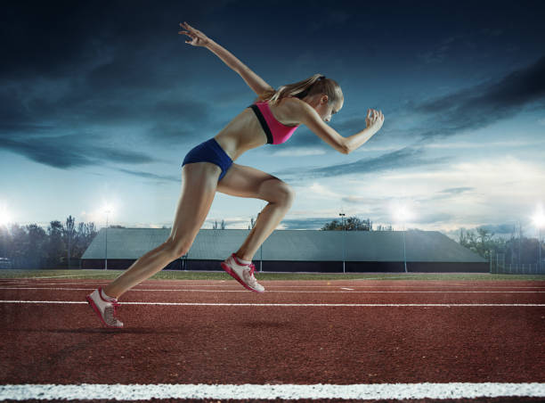 istock The woman running and training on running track 1081889874