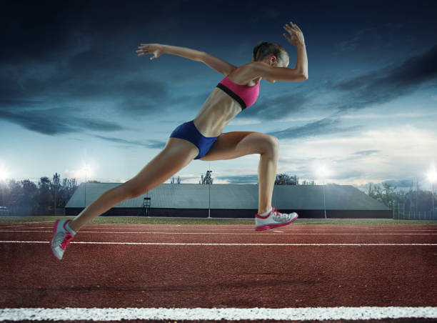 istock The woman running and training on running track 1081889878