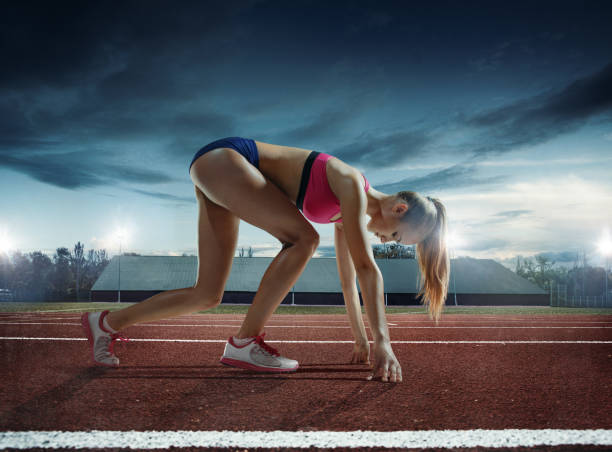 istock The woman running and training on running track 1081889880
