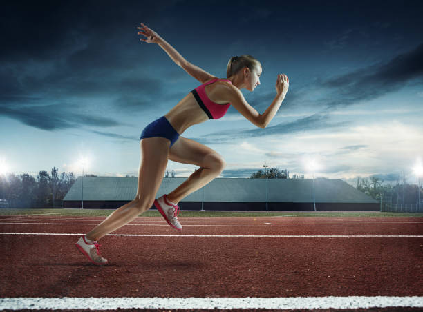 istock The woman running and training on running track 1081889884