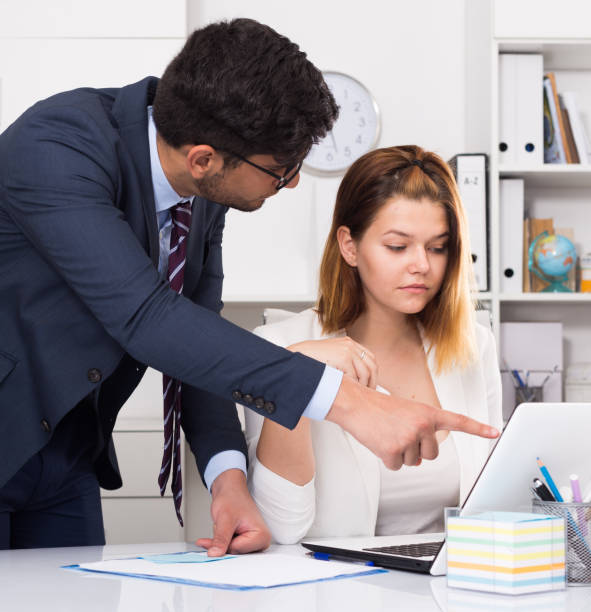 istock Angry boss blowing up female 1081892746