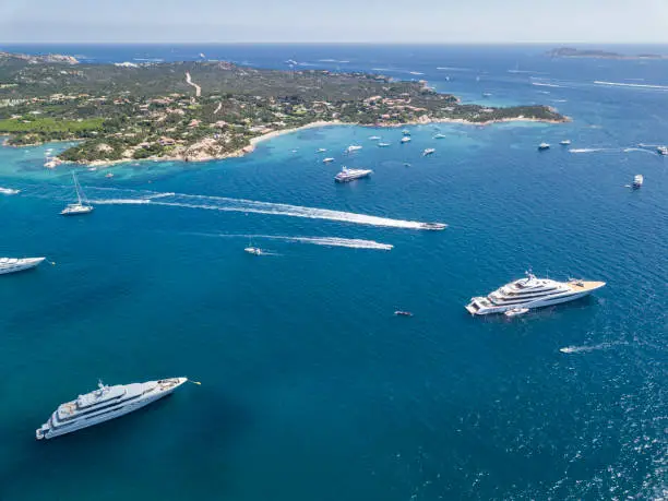 Aerial view of of Sardinia, Sardinia, Italy. 
Sardinia was created by Prince Karim Aga Khan and various other investors, Porto Cervo village is the main centre of Sardinia. This is one of most expensive areas in the world, along as being a luxury yacht magnet and billionaires' playground.