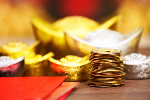 istock Gold bar and silver with red envelope decorate for chinese new year theme 1081897314