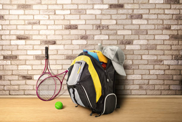 istock Outdoor backpack with clothes on a brick wall background 1081903628