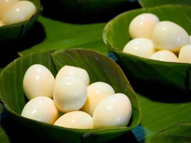 Photo of Boiled Quail Eggs in the Banana Leaf Bowls