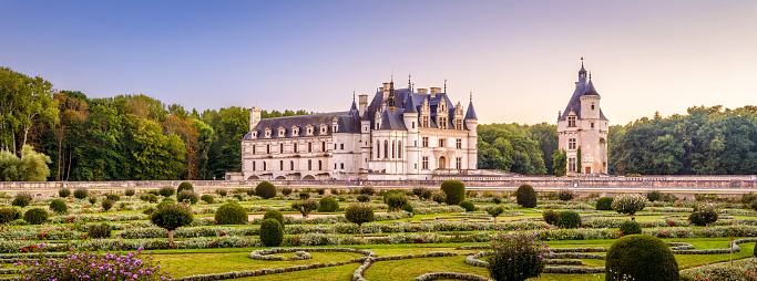 France - Sept 22, 2013: Castle or chateau de Chenonceau. This Renaissance castle is one of the main landmarks in France. Scenic panoramic view of the castle with beautiful garden. Scenery of French castle in summer.