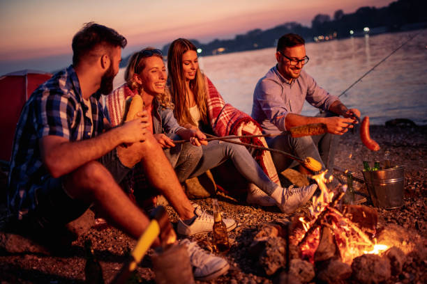 istock Friends having fun on the beach at night 1081910520