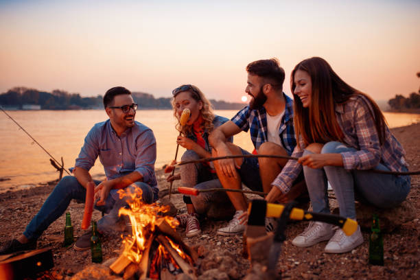 istock Friends having fun on the beach at night 1081910522
