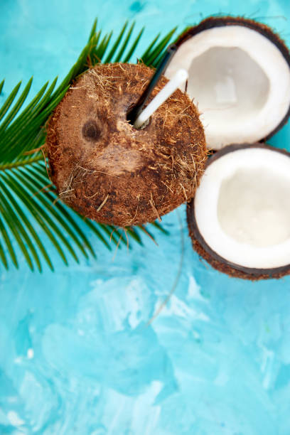 istock Coconut cocktail on brown background. Summer holiday drink concept, 1081911970