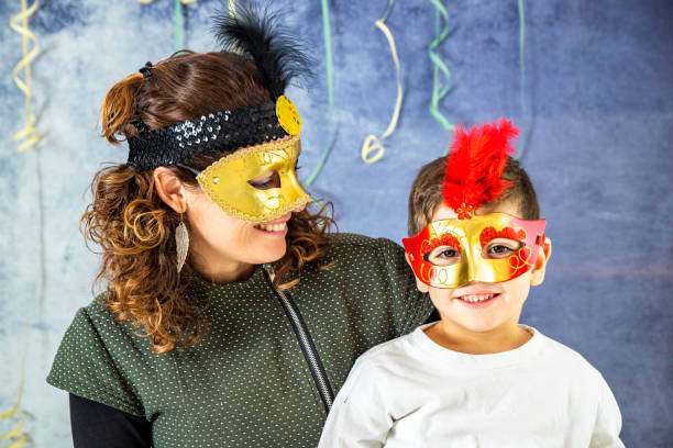 istock Mother and son celebrating Carnival at home 1081912110