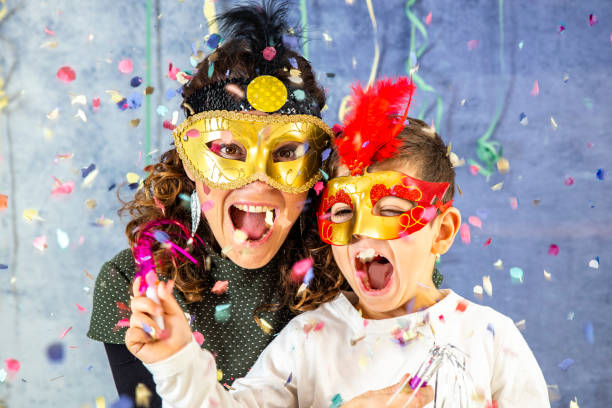 istock Mother and son celebrating Carnival at home 1081912138