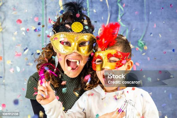 Mother And Son Celebrating Carnival At Home Stock Photo - Download Image Now - Carnival - Celebration Event, Child, Family