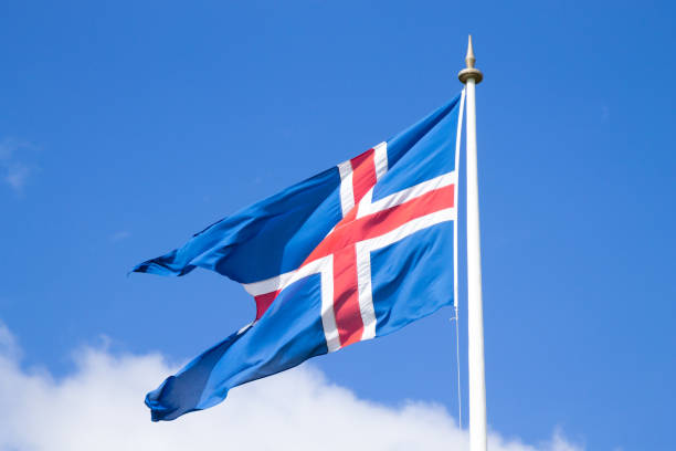 istock Iceland flag that waves over blue sky 1081914316