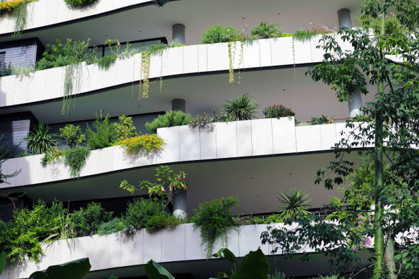 istock Modern Ecologic Skyscrapers With Much Green Plants On Every Balcony 1081915108
