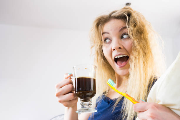 istock Funny woman being late drinking coffee 1081919852