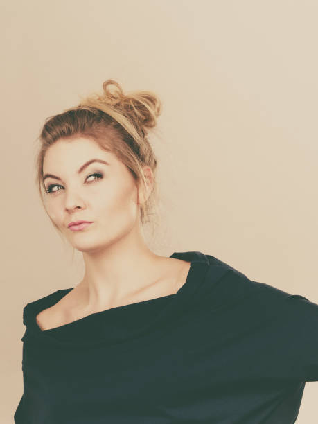 istock Blonde woman contemplating thinking about something 1081920252