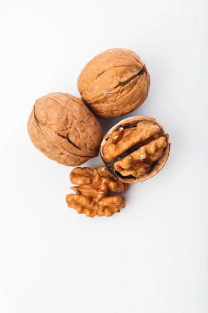 Photo of Food:  Top View of Walnut Isolated on White Background Shot in Studio