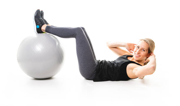 istock Runner woman isolated. sport model with ball isolated on white background. 1081925472