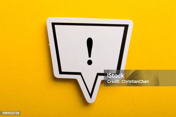 Exclamation Mark Speech Bubble Isolated On Yellow Stock Photo - Download Image Now - Urgency, Advice, Danger