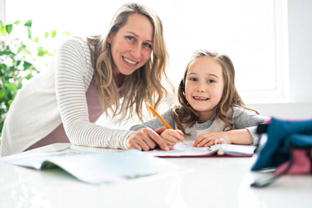 istock A Mother and Child doing homework at home 1081926412