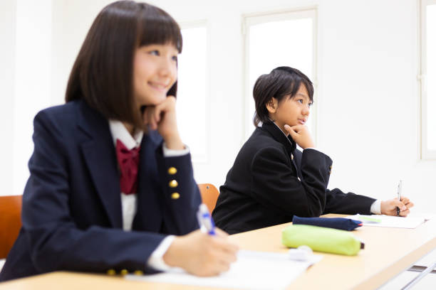 istock Junior high school students studying at cram school 1081930060