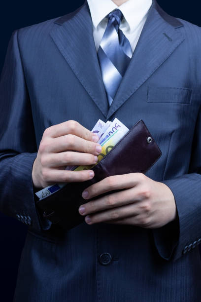istock Man purse money 1081935412