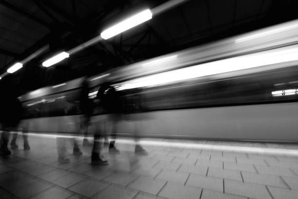 istock Moving Feet with Speeding Train in the Background. 1081939534