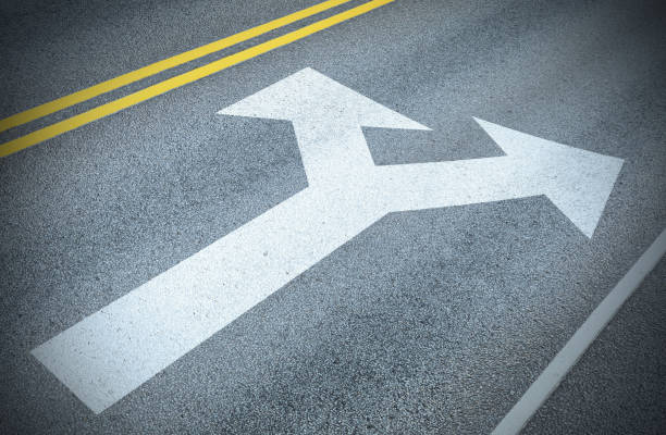 istock Decision time. Into the future. New arrow painted on asphalt. Road markings 1081941130