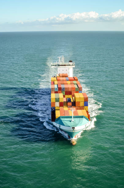 istock Cargo in the middle of the ocean 1081944352