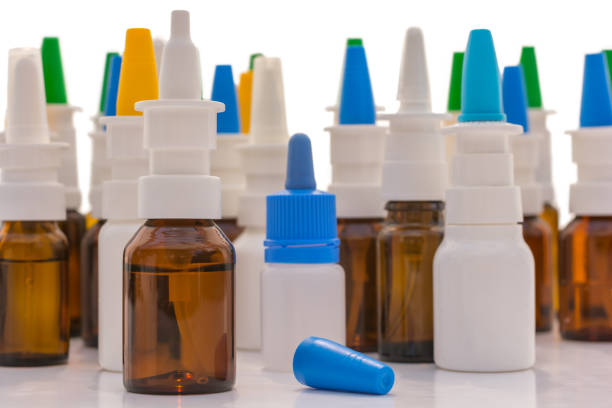 istock Many nasal spray in front of white background 1081947930