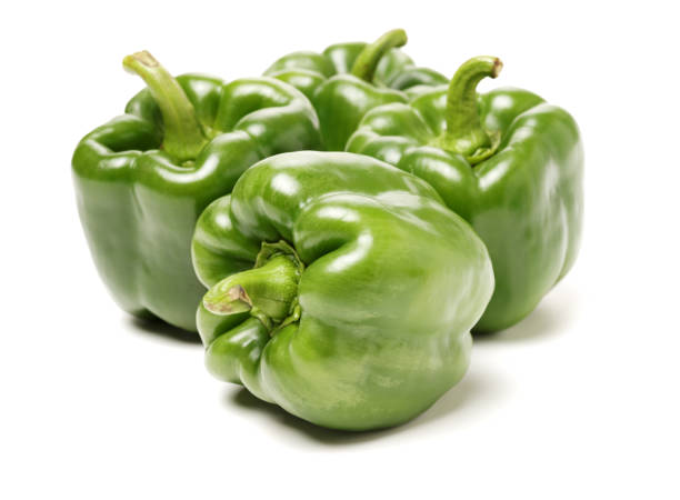 istock Green pepper isolated on white background 1081950856