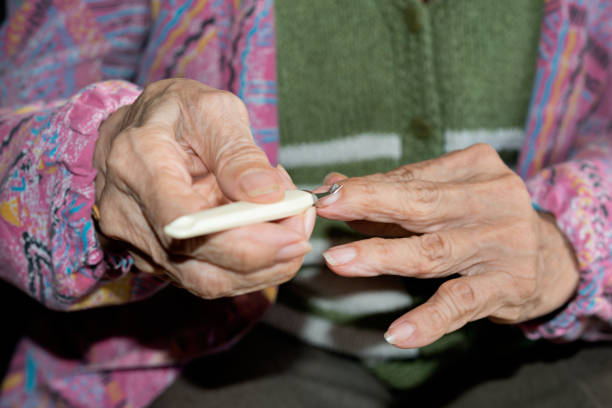 istock Hands of elderly person 1081951310