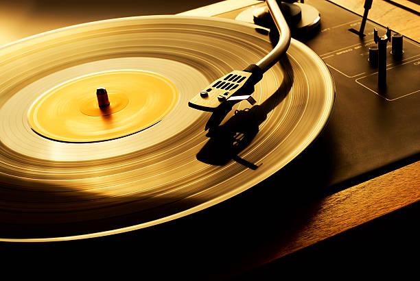 Record Spinning on Turn Table  retro turntable stock pictures, royalty-free photos & images