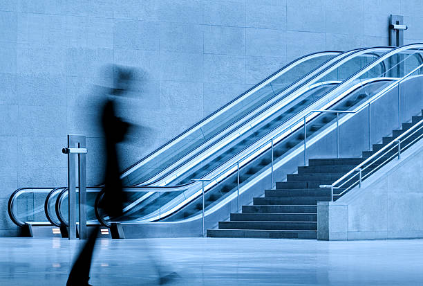 istock Motion Blur of Person and Escalator 108195256