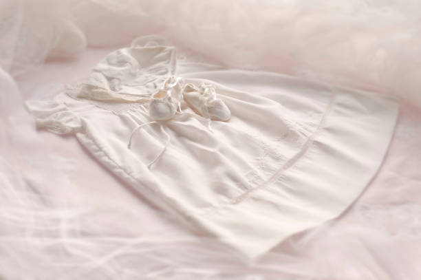 istock Baptism gown with booties & bonnet 108195304