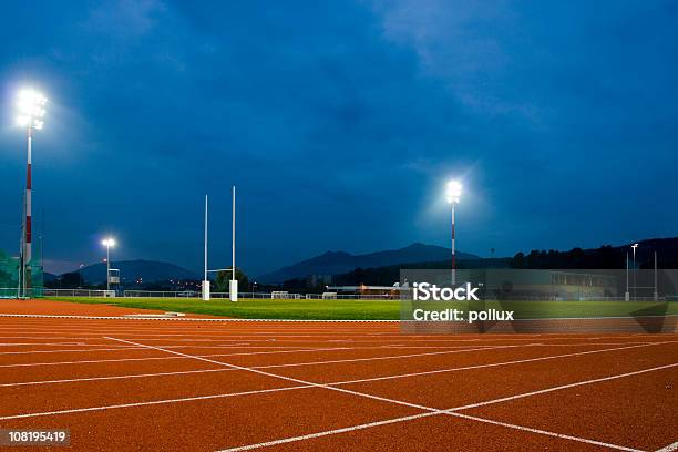 Track And Field Stadium At Night Stock Photo - Download Image Now - No People, Track and Field Stadium, Rugby - Sport