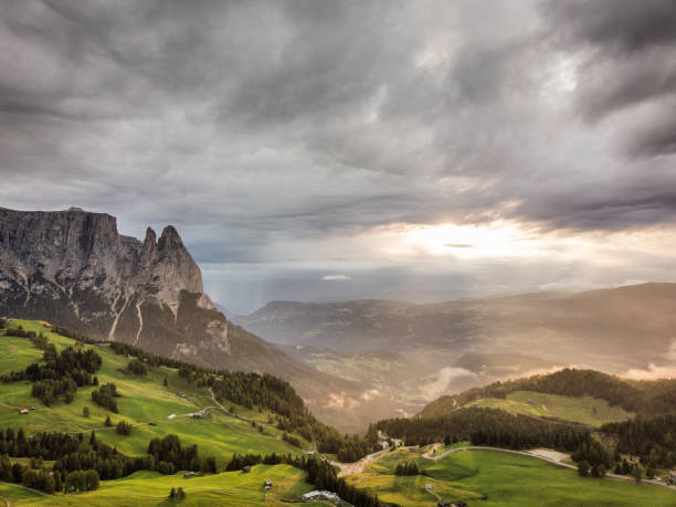istock Aerial view of Sciliar mountains with sunlight and dramatic sky - Dolomites 1081954264