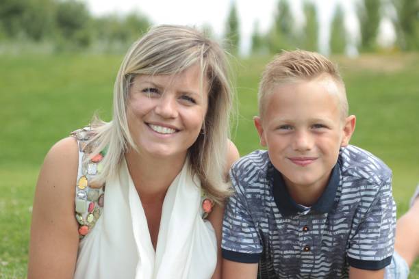 istock Mother and her son outside 1081954550