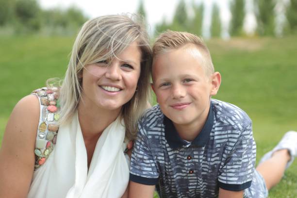 istock Mother and her son outside 1081954570